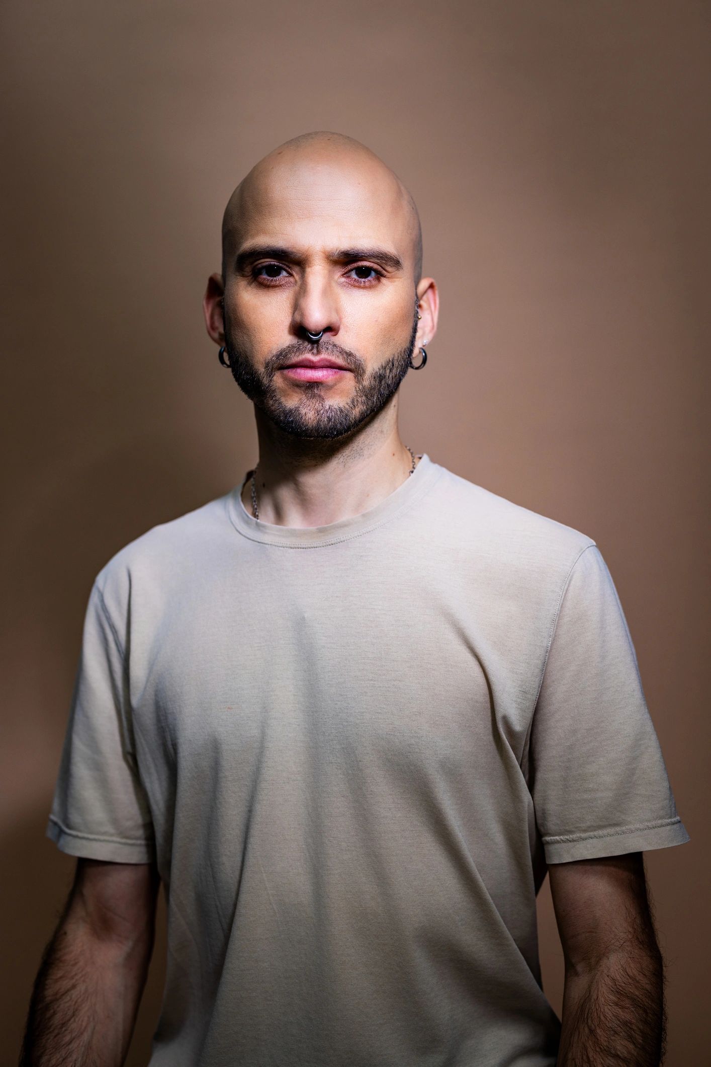 Studio portrait representing the creator profile